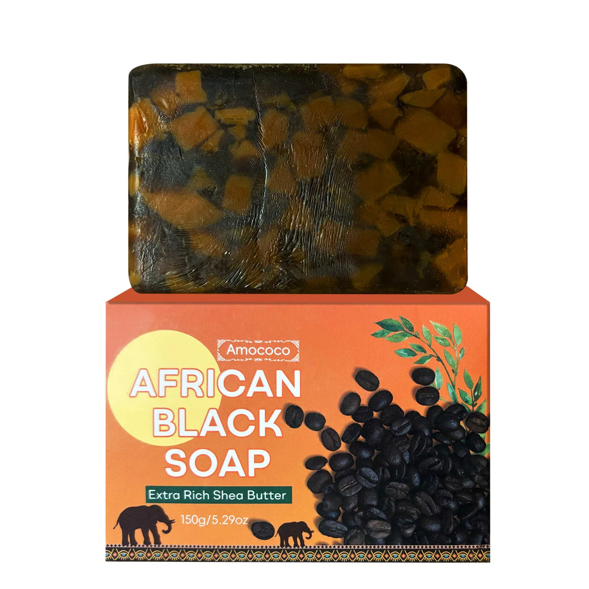 Rectangular bar of African black soap on top of its orange packaging box