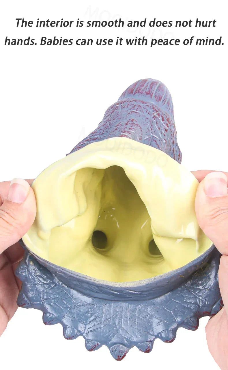 Interior view of a soft rubber animal hand puppet showing the smooth surface inside.