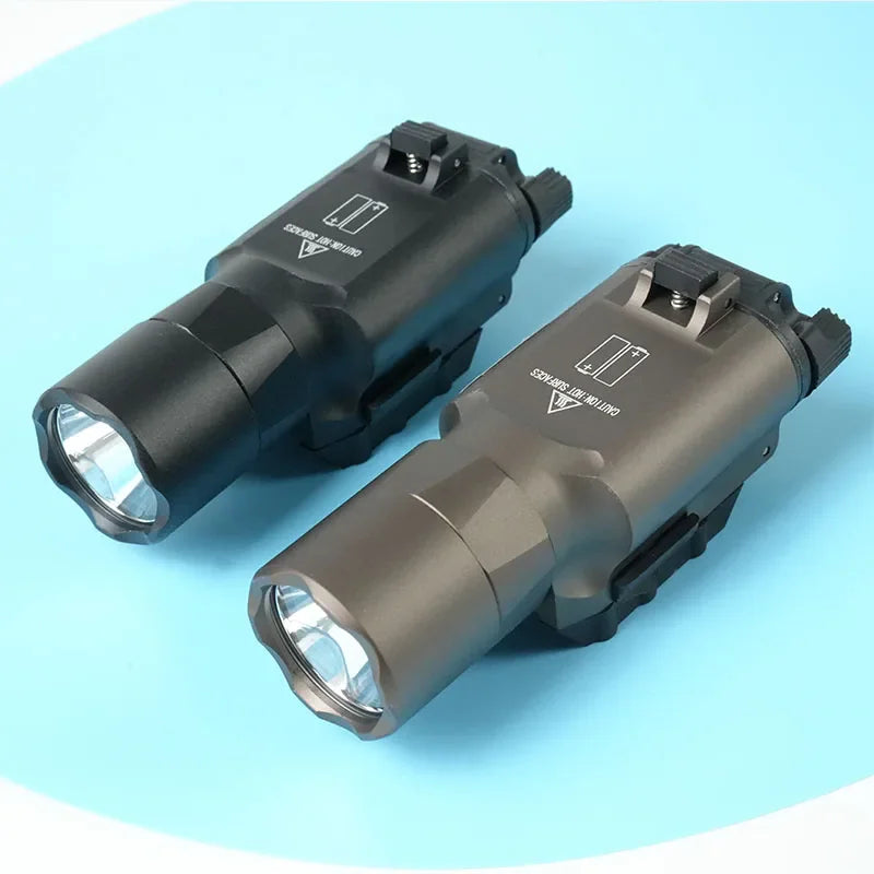 Two tactical LED flashlights in black and metallic brown, high angle view