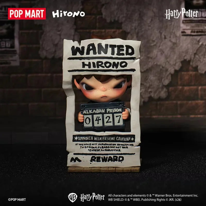 Small figurine of a character standing inside a decorative wanted poster frame