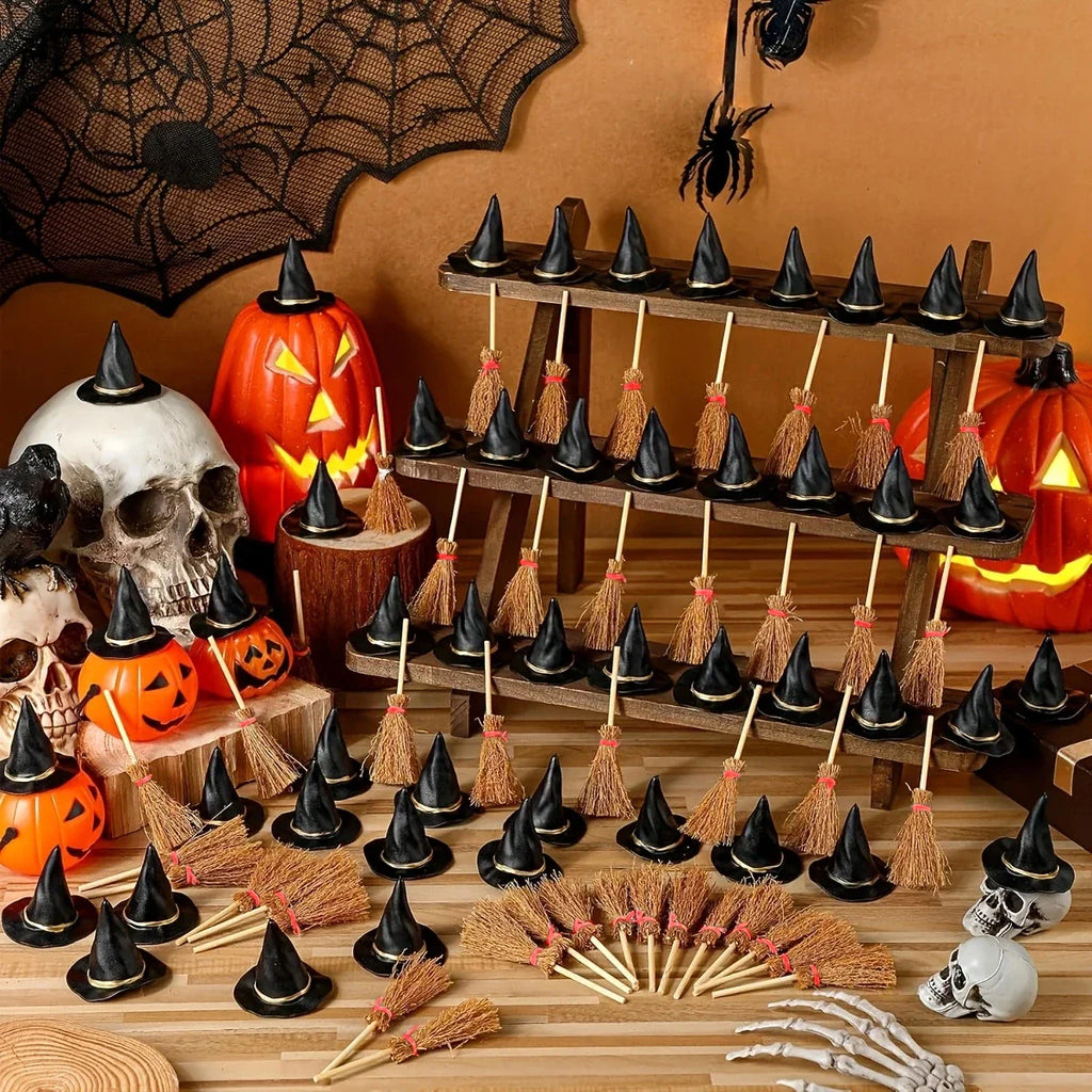 A set of miniature witch hats and straw brooms on a wooden rack for Halloween decoration