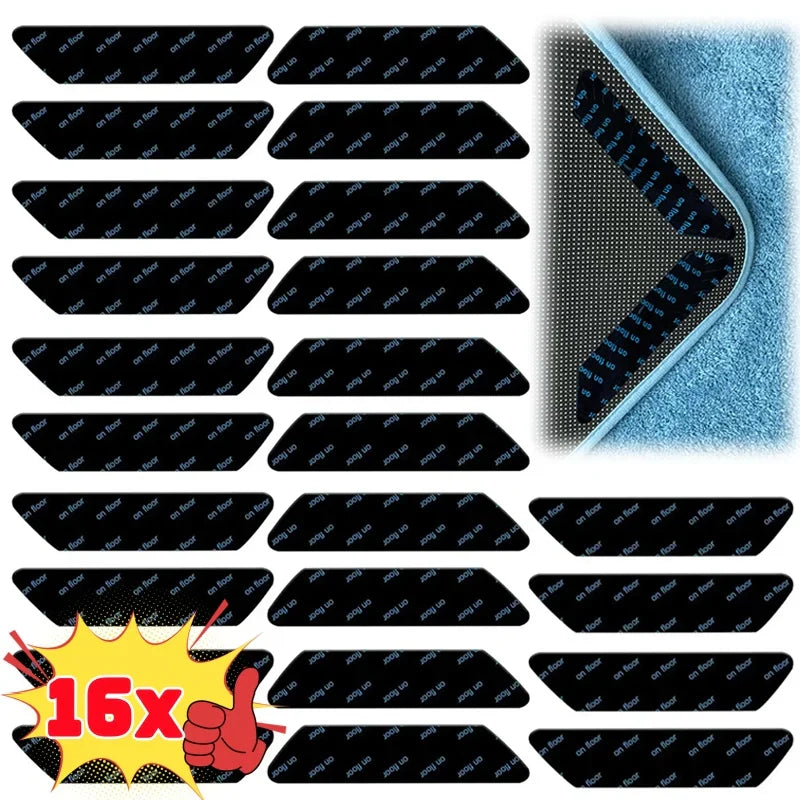 A set of 16 black non-slip rug corner grippers showing their placement on a blue carpet