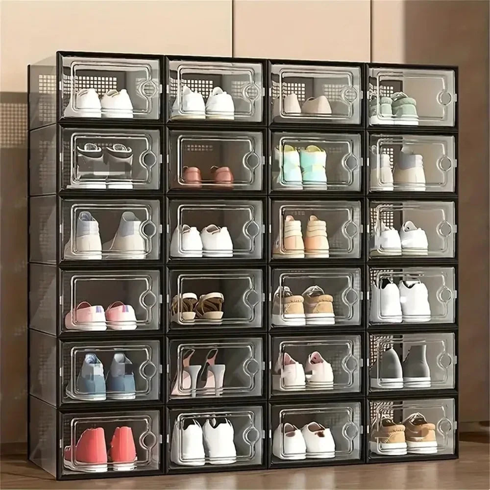 Stack of 24 transparent plastic stackable shoe storage boxes containing various types of footwear
