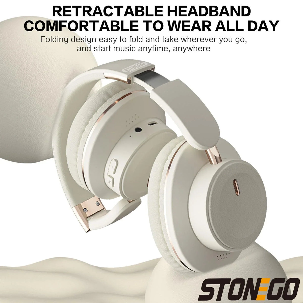 Beige foldable wireless headphones with text highlighting ergonomic design and headband features
