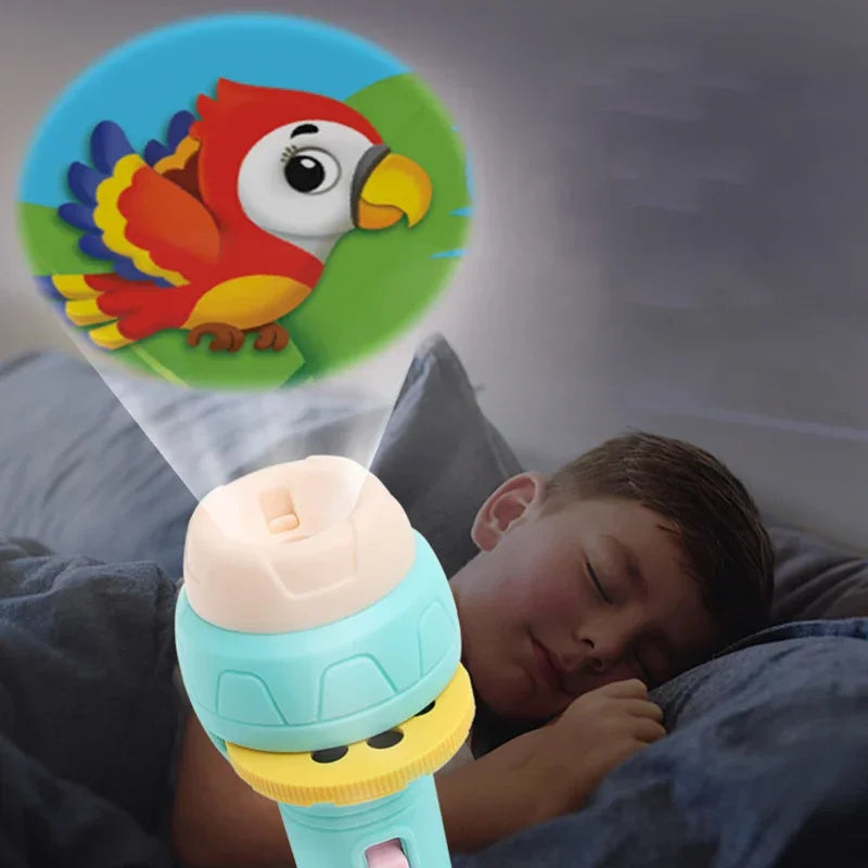 Child sleeping in bed while a flashlight projector shines a colorful cartoon bird image on the wall