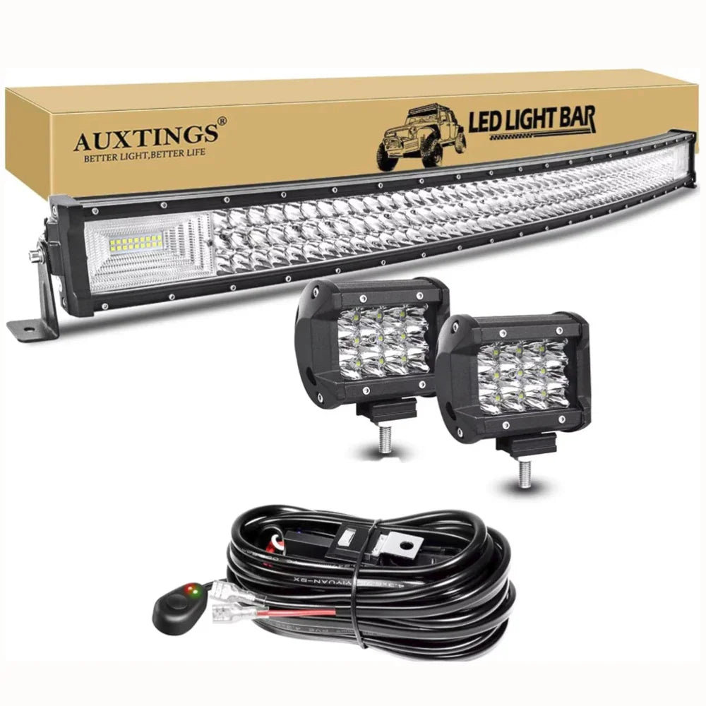 Curved LED light bar, two small square LED work lights, and a wiring harness kit for vehicles.