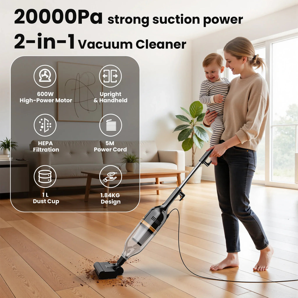 A woman holding a baby and vacuuming a wooden floor with a black stick vacuum cleaner