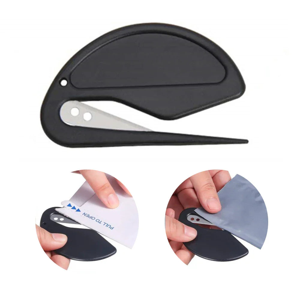 A black plastic safety envelope opener shown in use cutting open mail and a plastic bag.