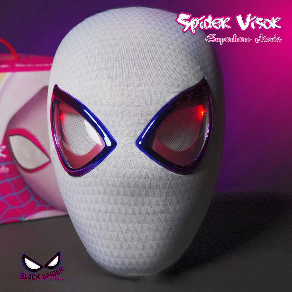 White glowing superhero mask displayed next to its product packaging.