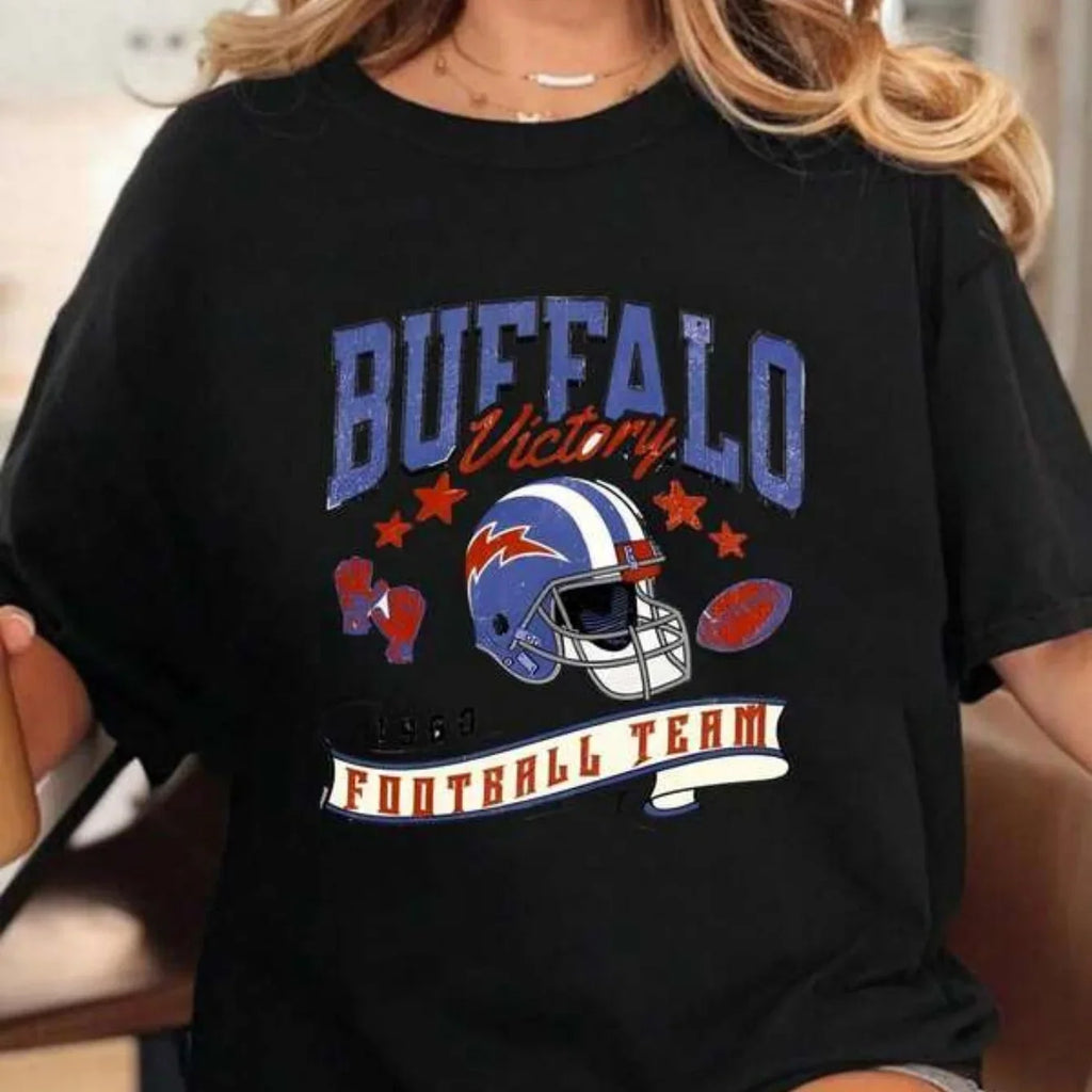 Black unisex cotton t-shirt with vintage style American football graphic print featuring a helmet and team text