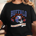 Black unisex cotton t-shirt with vintage style American football graphic print featuring a helmet and team text