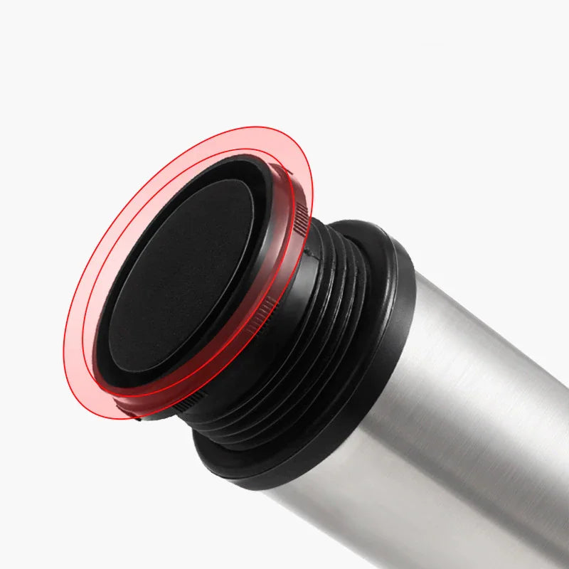Close-up of the adjustable base of a stainless steel furniture leg highlighted with a red circle