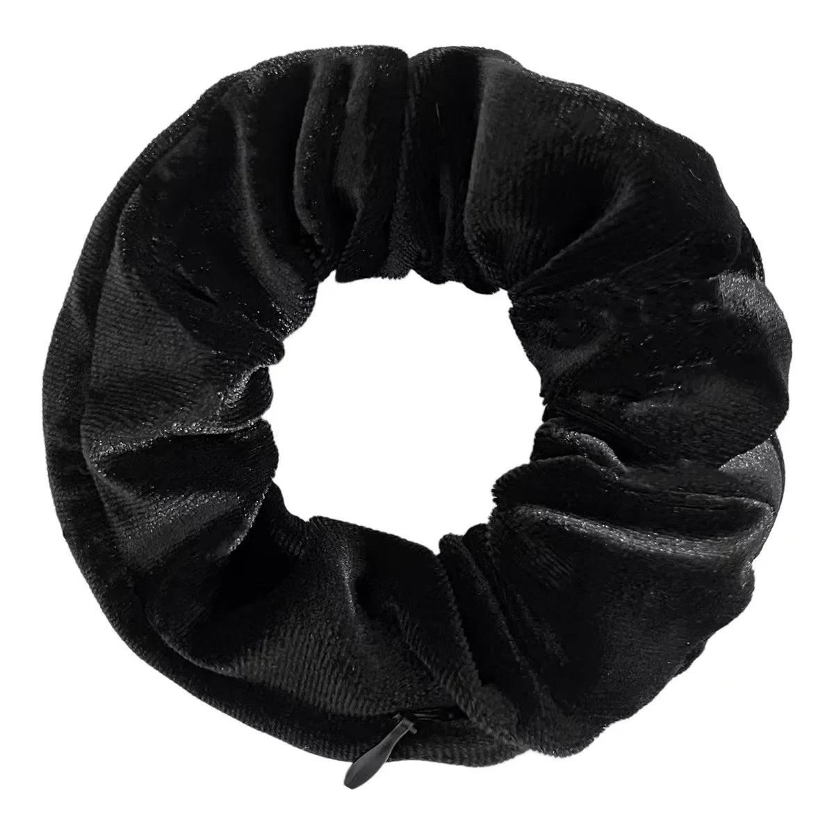 A plain black velvet hair scrunchie with a small hidden zipper closure.