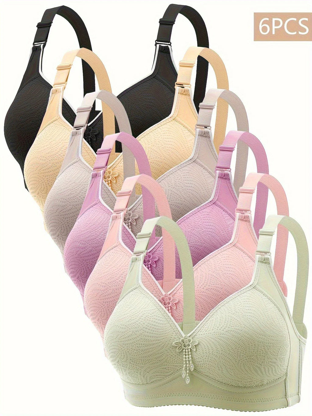 A collection of 6 assorted color wireless bras with lace texture and center embellishments