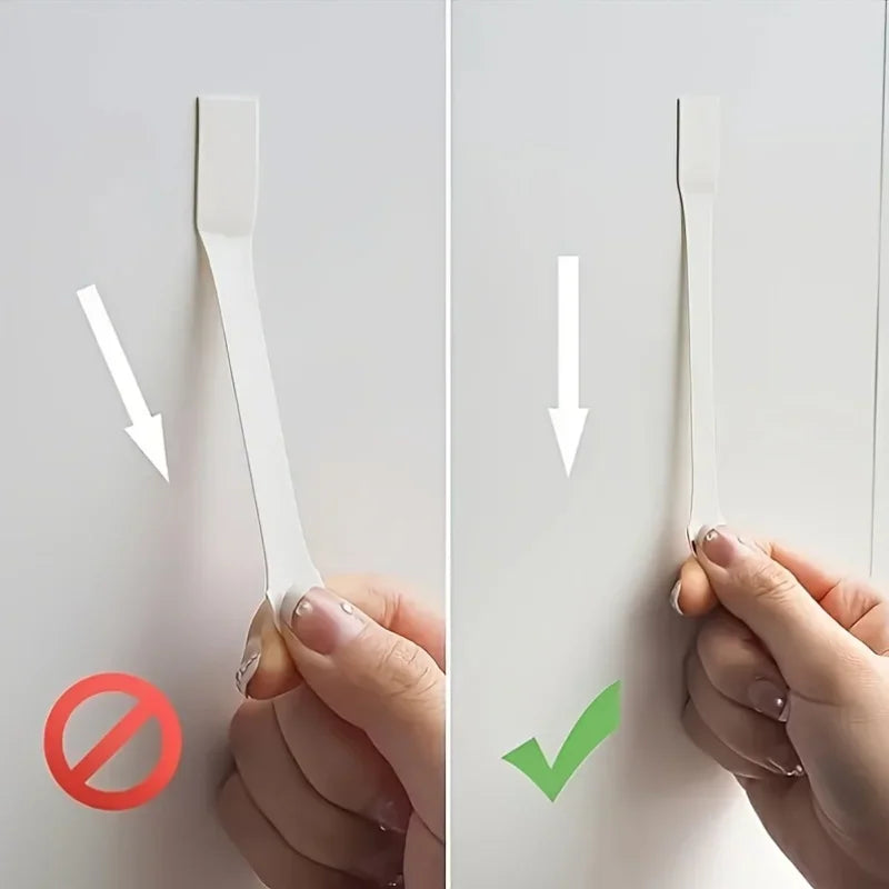 Instructions on the correct way to pull and remove damage-free adhesive strips.