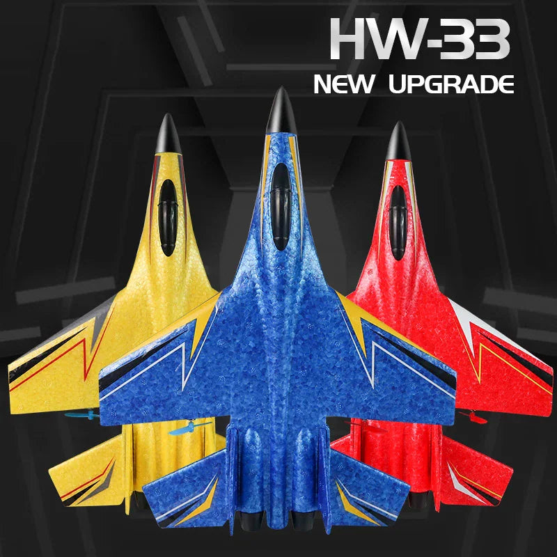 Three foam RC fighter jets in yellow, blue and red on a dark background