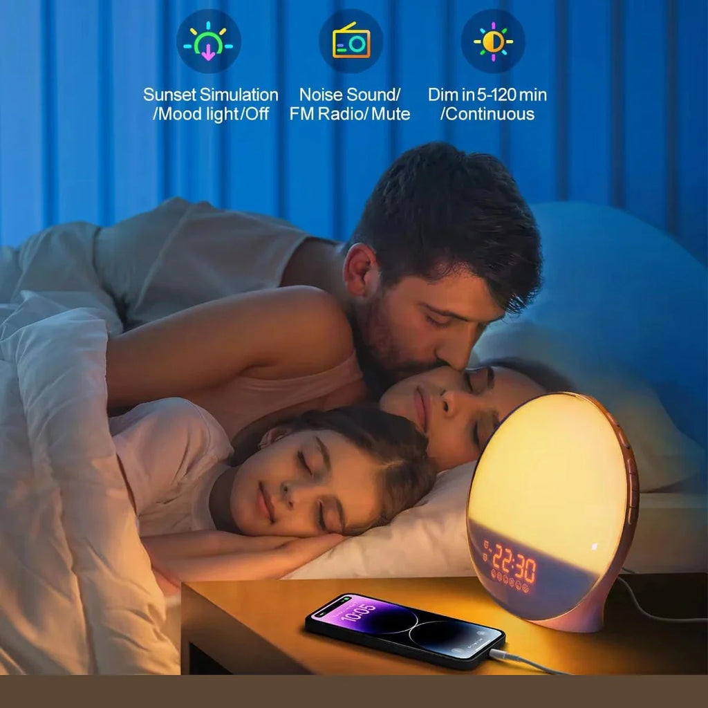 Couple sleeping in bed with a sunrise simulation wake-up light on the nightstand