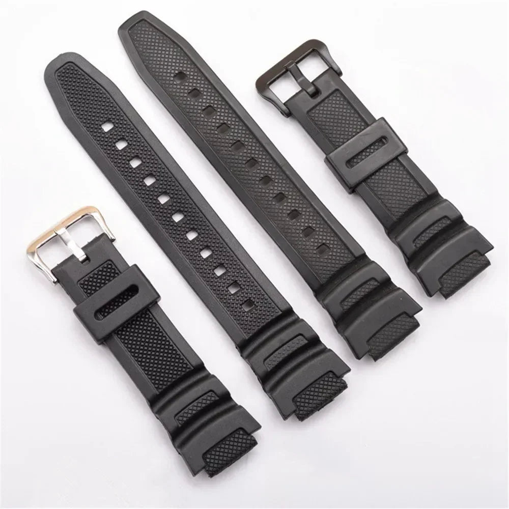 Top view of a black rubber watch strap set with buckle