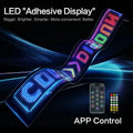 Flexible LED display screen showing colourful scrolling text with a remote and mobile app interface