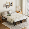 Black metal platform bed frame in a cozy bedroom setting with under-bed storage