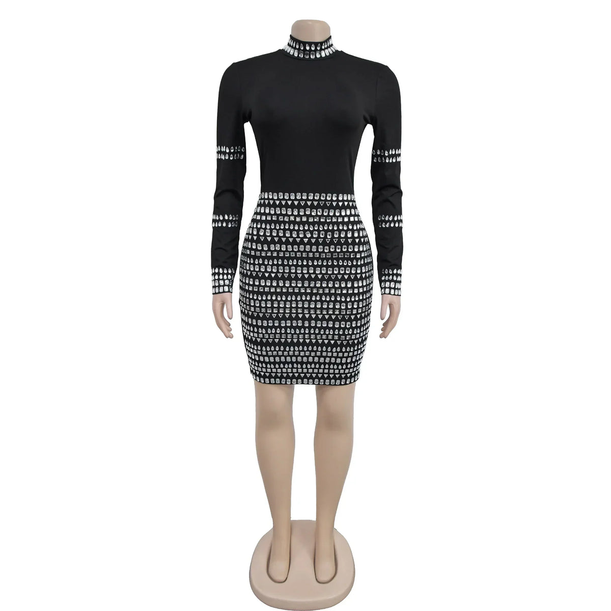 Black mini dress with long sleeves and heavy silver rhinestone embellishments on a mannequin.