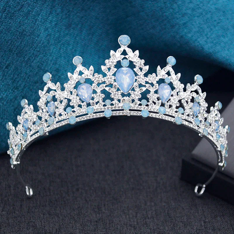 Silver tiara with light blue teardrop and round rhinestones