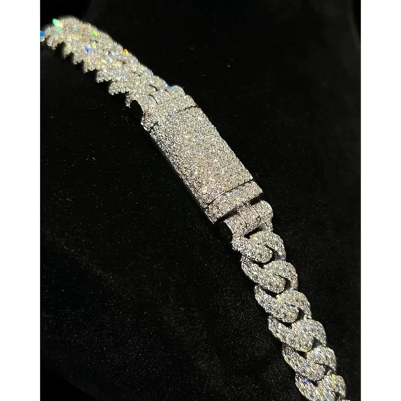 Close up of a luxury Cuban link chain clasp covered in iced out moissanite stones