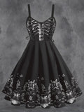 Black sleeveless dress with white skeleton ribcage graphic on bodice and ornate skeleton pattern on hemline