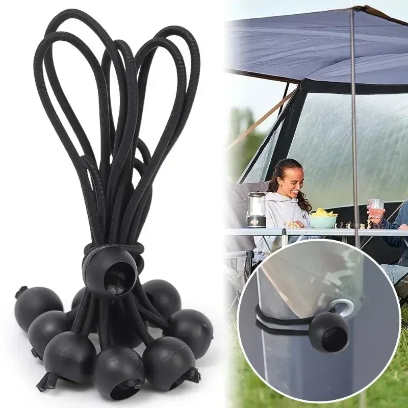 Black elastic bungee cords with ball ends used for securing tent fabrics