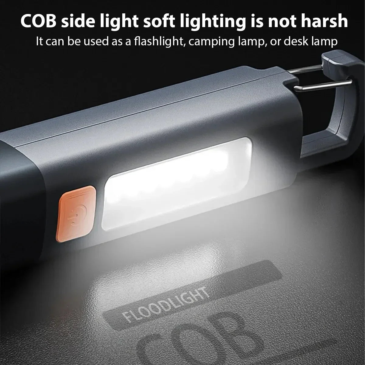 Close up of a grey handheld LED flashlight with COB side light switched on