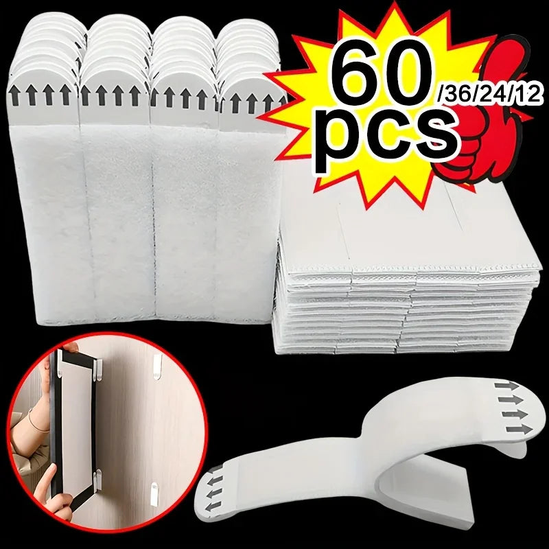A bulk pack of white adhesive wall hanging strips for picture frames.