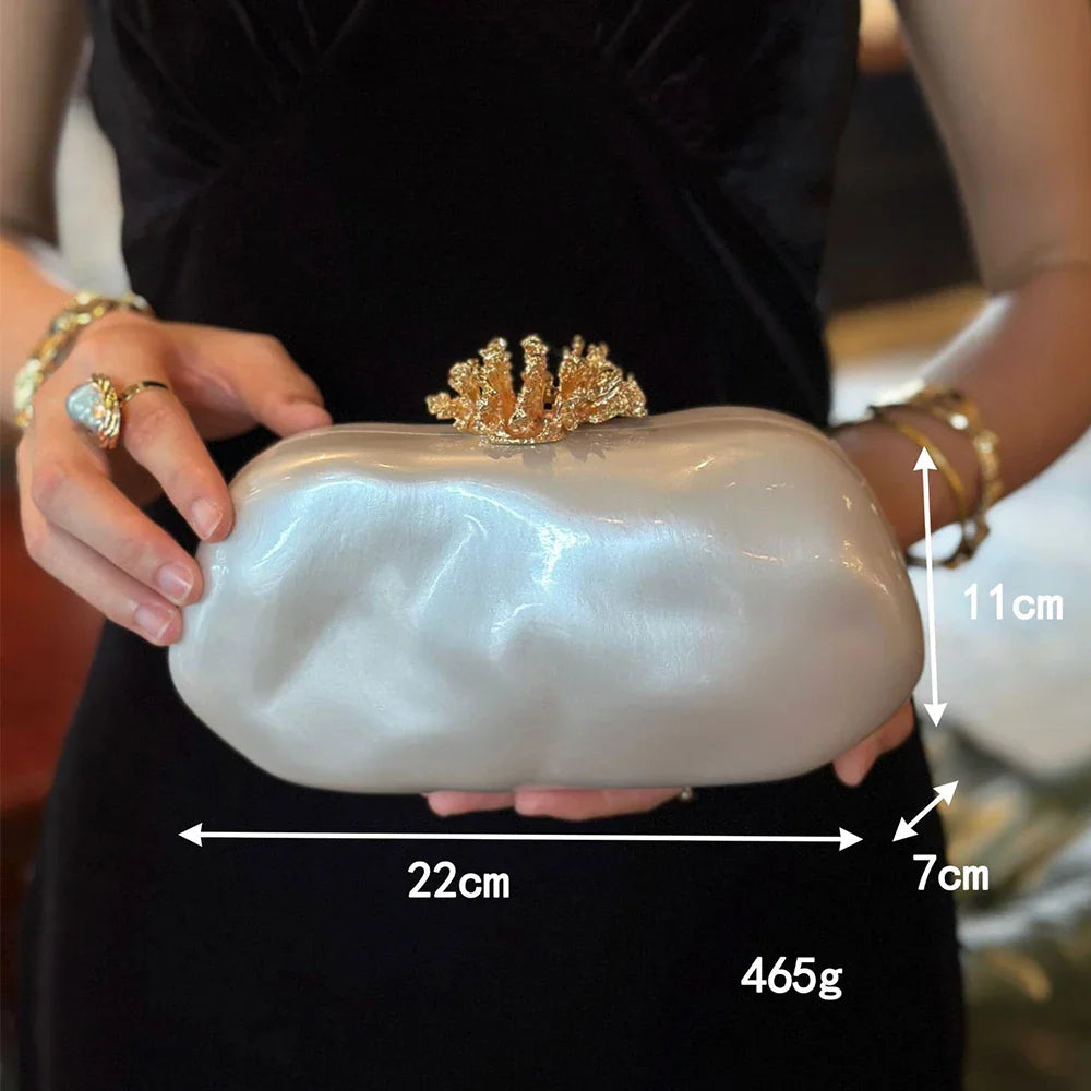 White marbled acrylic evening clutch with dimensions and weight overlaid