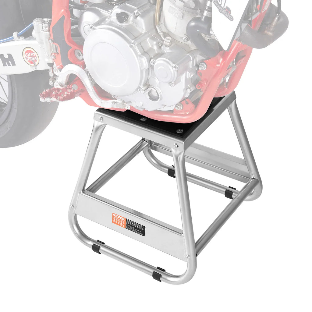 Metal dirt bike maintenance stand with black rubber top platform