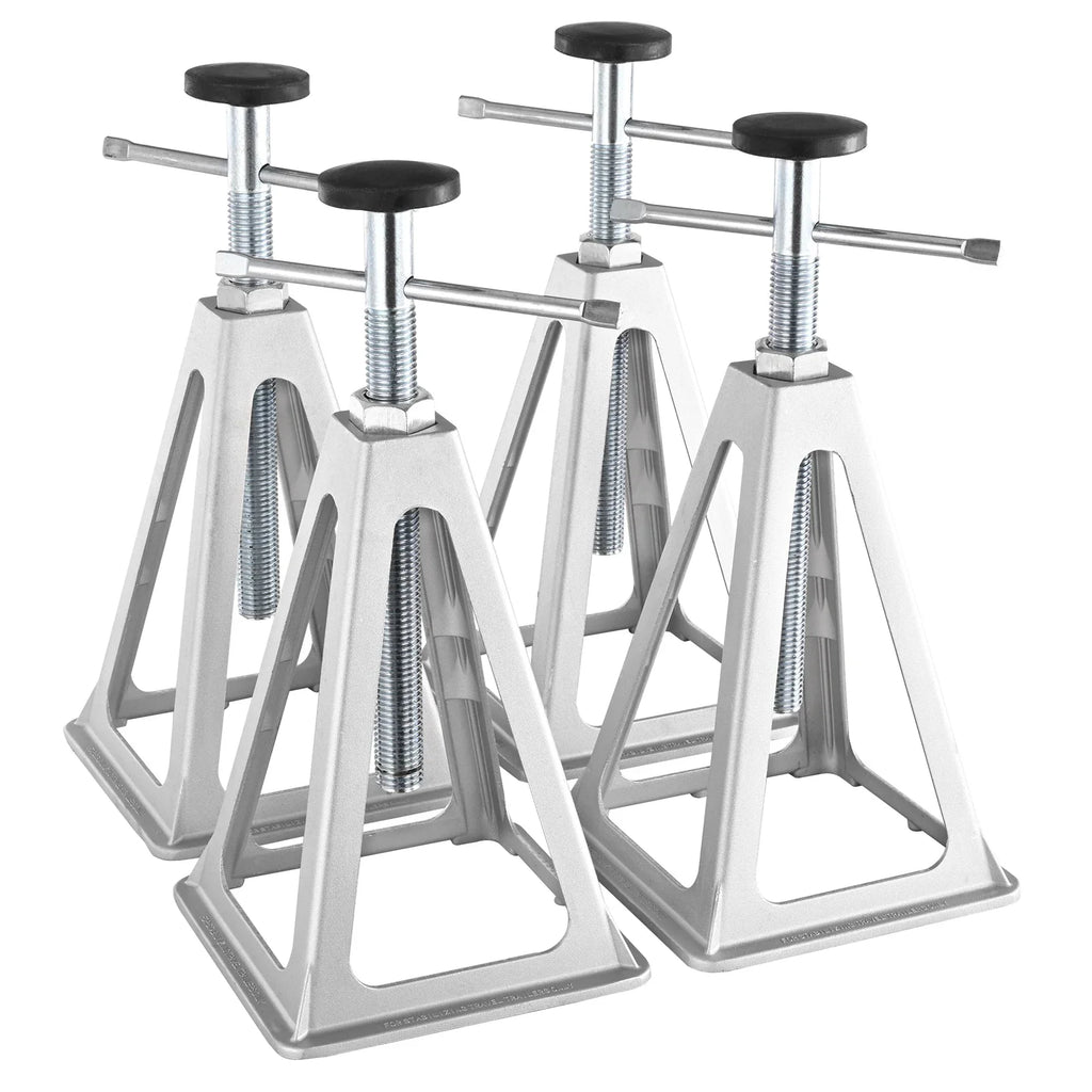 A set of four silver metal aluminum RV stabilizer jacks with adjustable threaded T-handle posts.