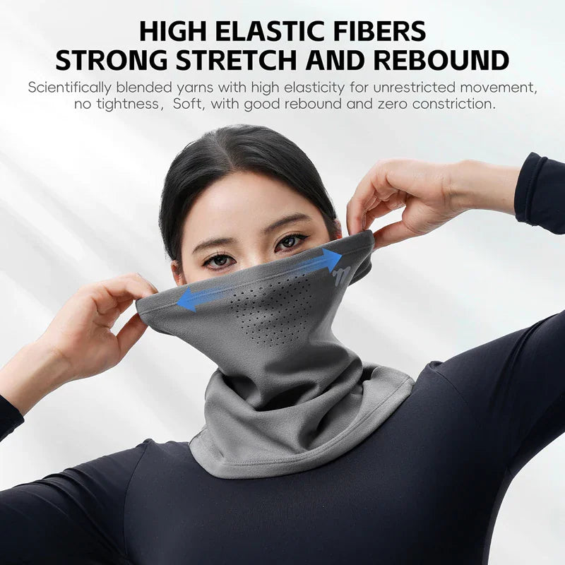 Close-up of a person stretching a highly elastic, grey thermal fleece face mask