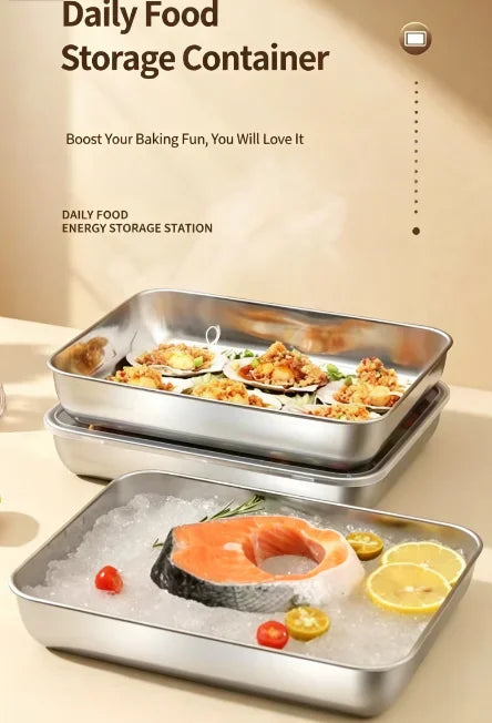Stainless steel food storage trays with fresh fish and seafood on ice