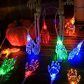 20 LED Halloween skeleton hand string light in multiple colors on a dark background – RGB