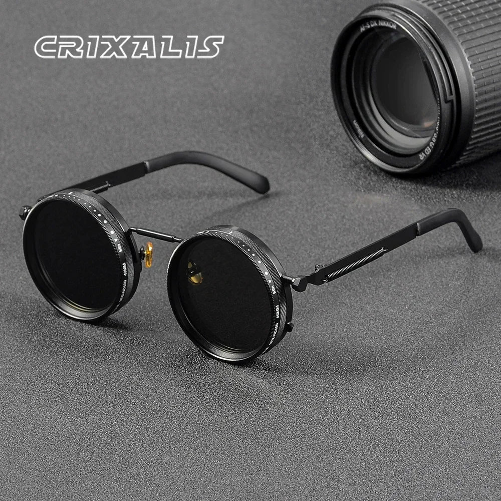 Black round sunglasses with an adjustable lens mechanism.