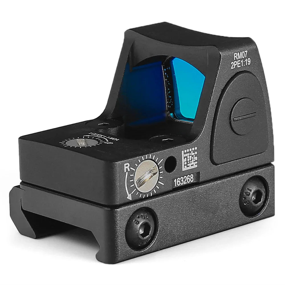 Black miniature red dot reflex sight side view with blue lens