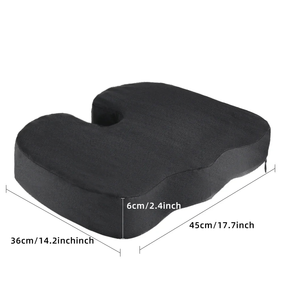 Black U-shaped orthopedic seat cushion with dimensions labeled in inches and centimeters