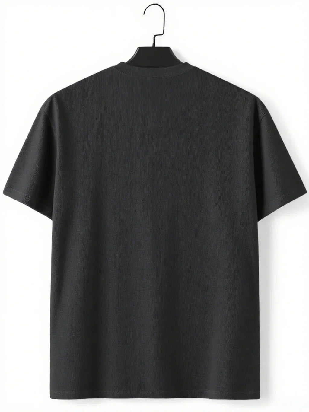 Plain black t-shirt back view on a clothes hanger