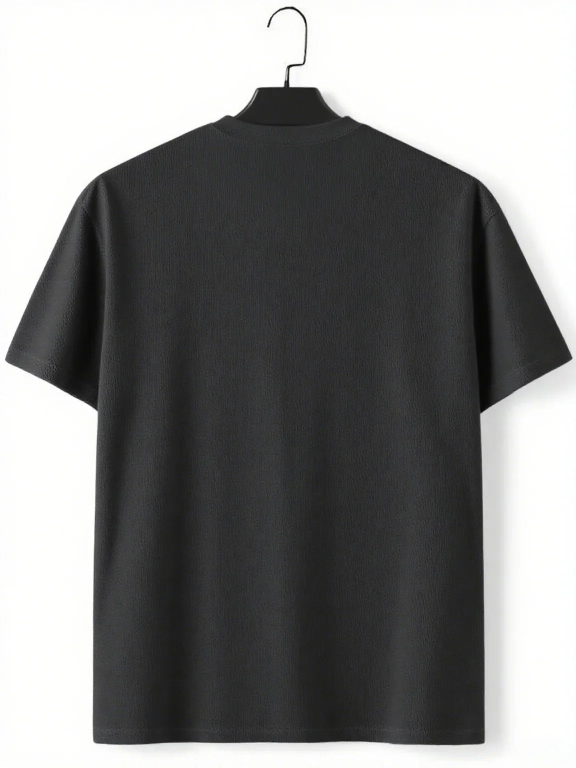 Plain black t-shirt back view on a clothes hanger
