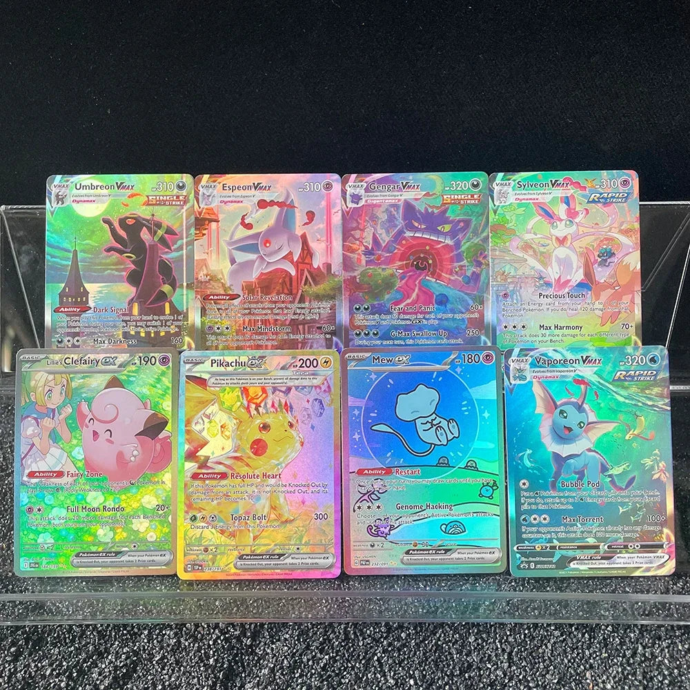 Collection of eight holographic trading cards displayed in a clear plastic stand