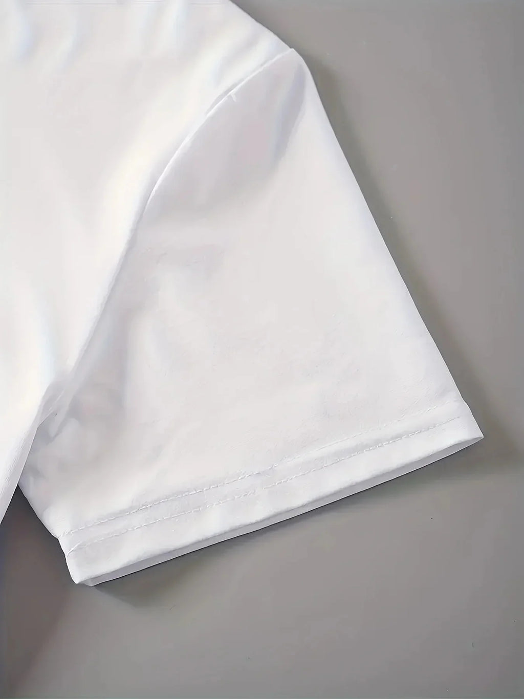 Close-up of the short sleeve on a plain white t-shirt