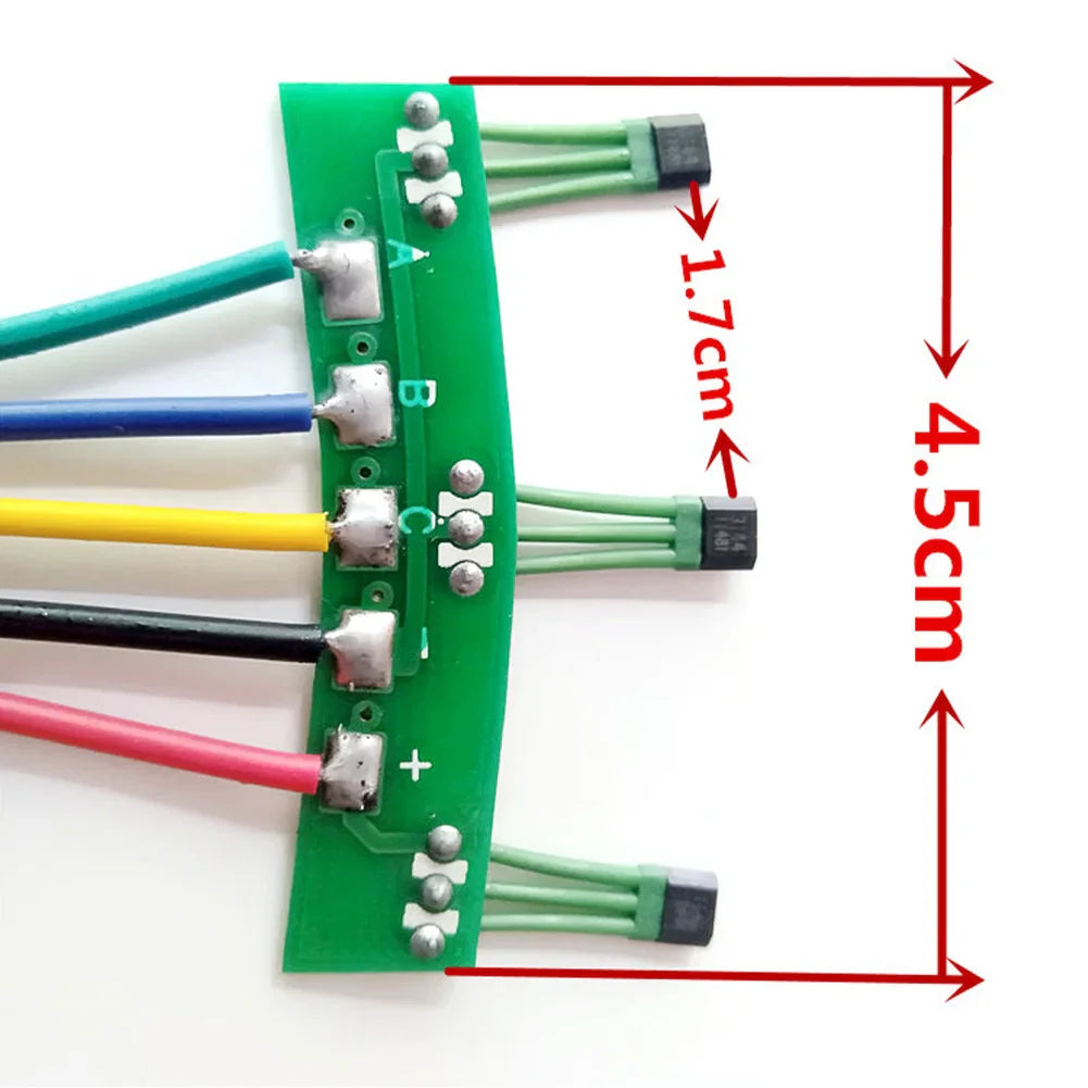 Green PCB hall sensor board with multi-colored wires and measurement indicators