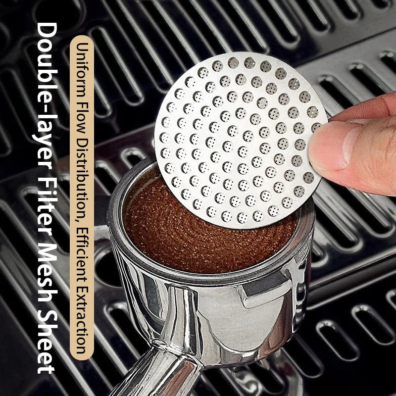Stainless steel espresso puck screen being placed into a portafilter with coffee grounds