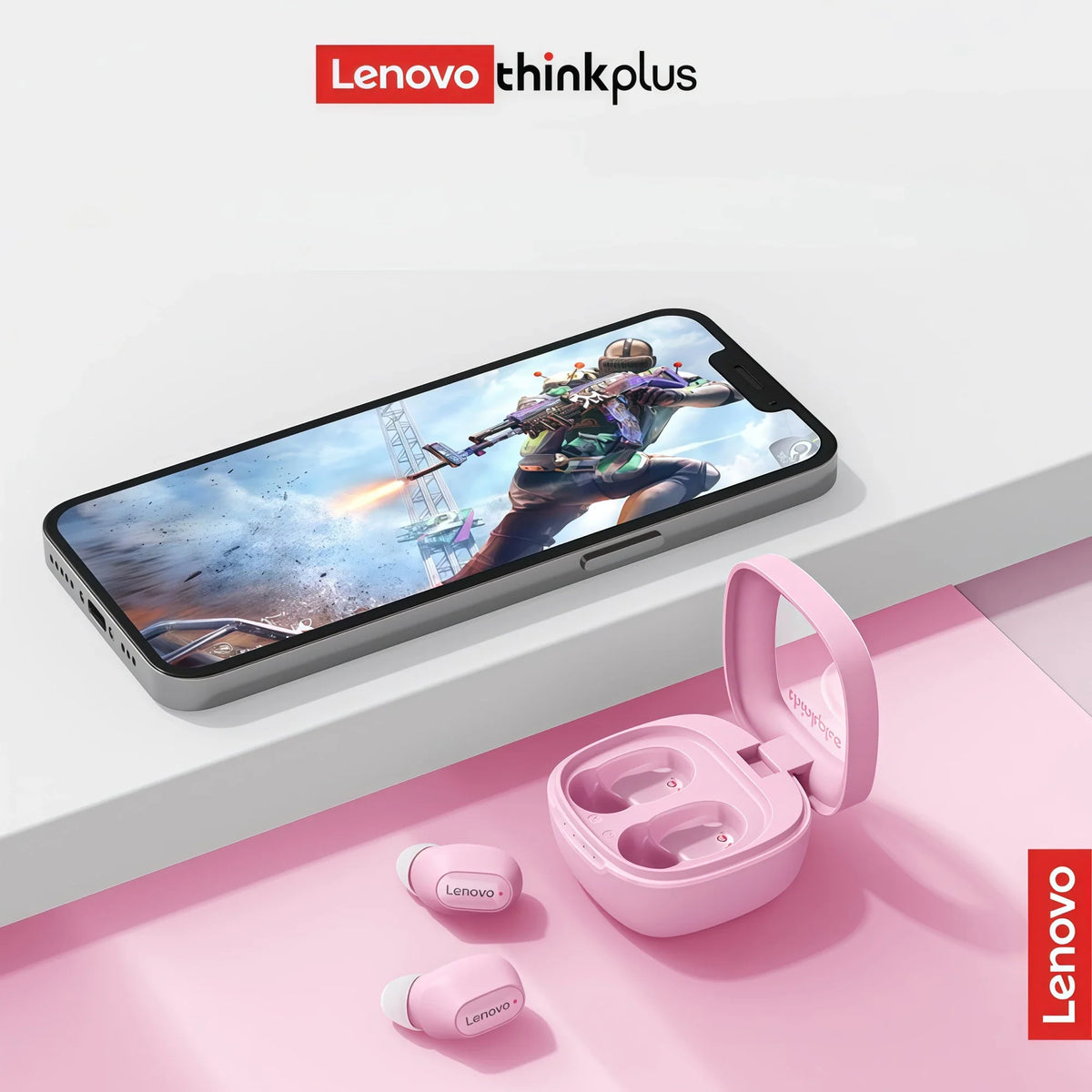 Pink wireless earbuds next to a smartphone displaying a video game