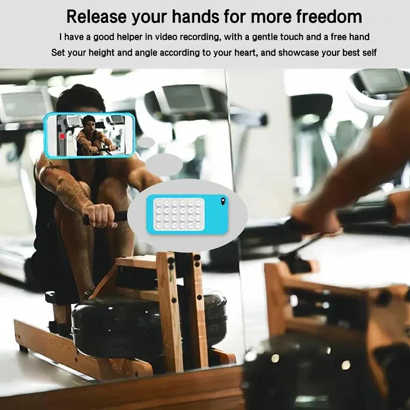 Usage demonstration of a smartphone attached to a mirror via a suction cup mount during exercise