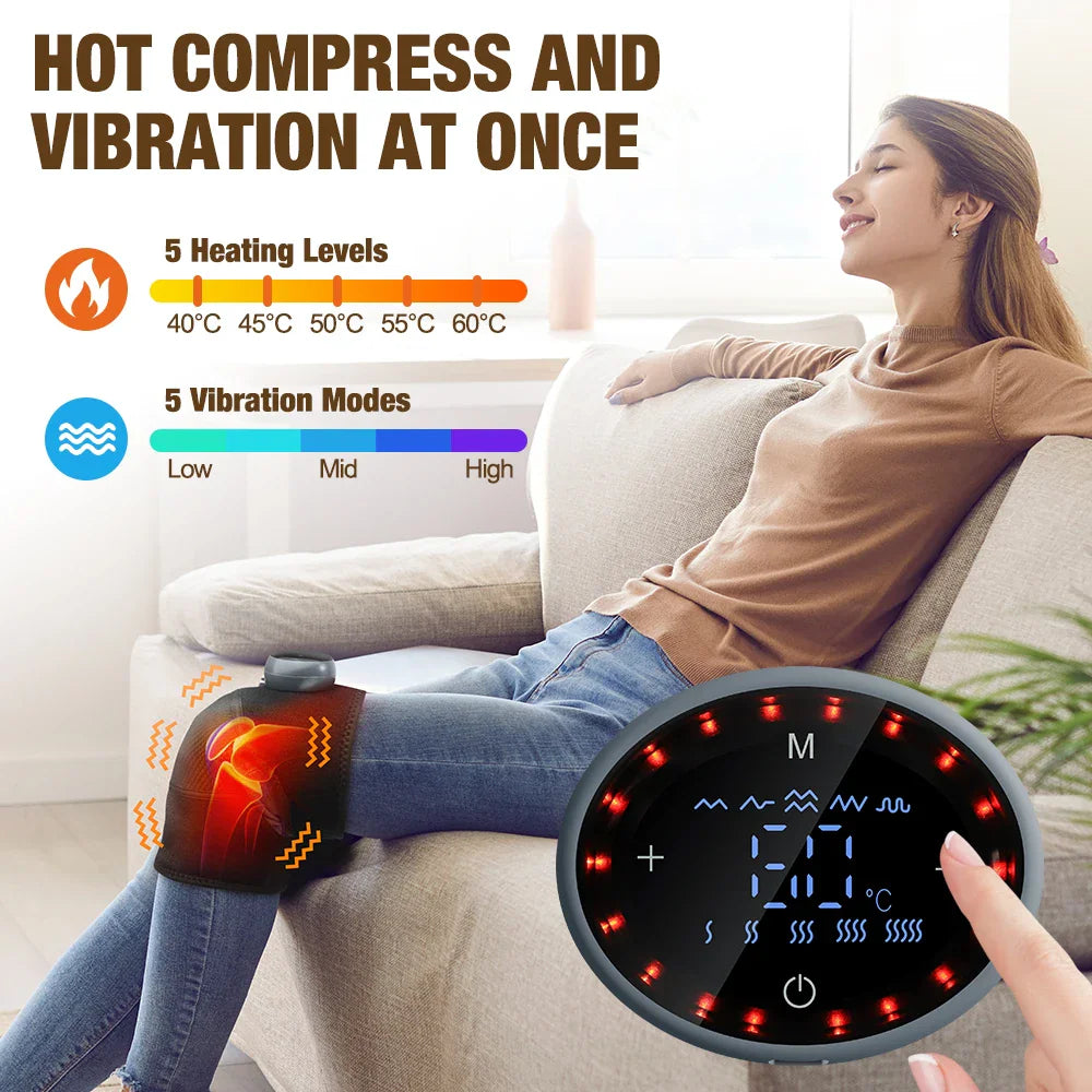 Woman using a wireless knee heating and vibration massager while sitting on a couch