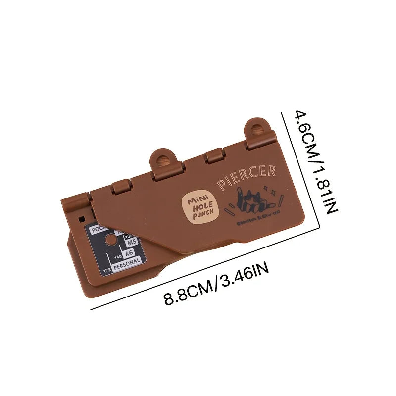 A brown portable mini hole puncher shown with its dimensions annotated on the image.
